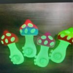 4-inch glow-in-the-dark silicone pipe with a mushroom design, heat-resistant and portable for easy use.