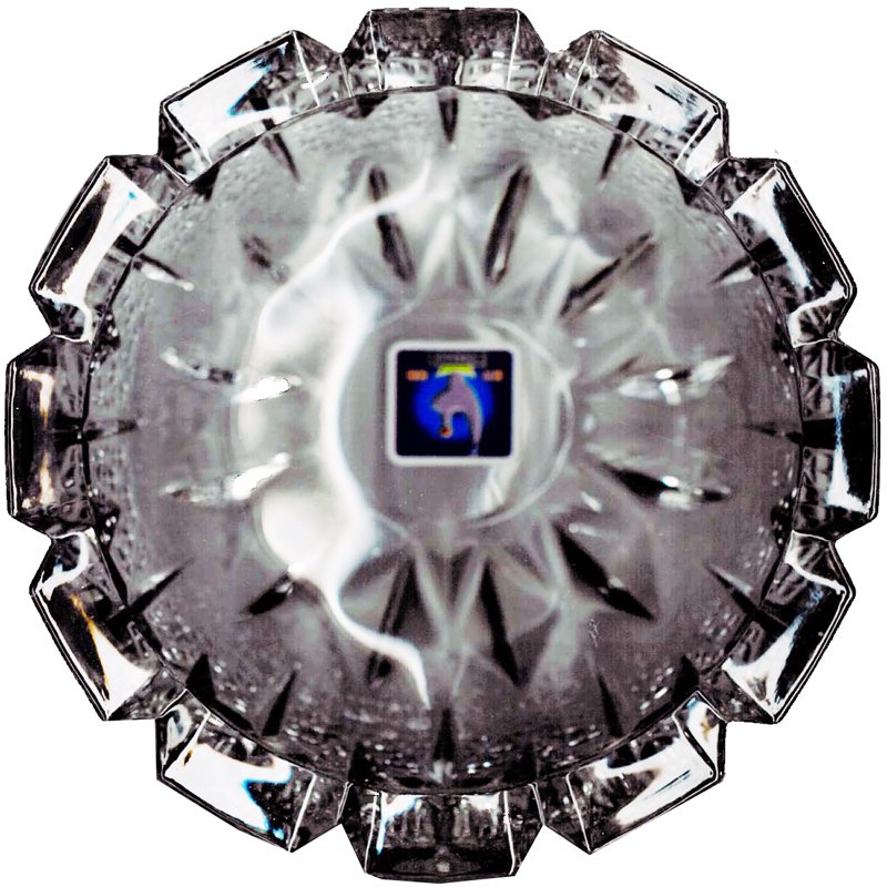 6-inch round glass ashtray with four cigarette rests, perfect for home or commercial use.